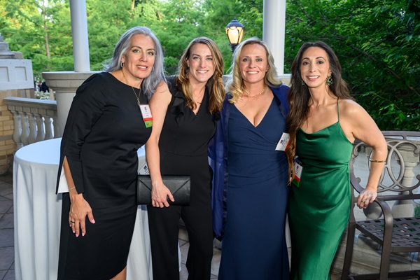 LI 3 Morgan Adamski, Kristina Walker, and friends at INSA's Baker Award Dinner